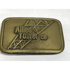 Vintage 1970s Allied Tower Co. Brass Belt Buckle with Power Line in background
